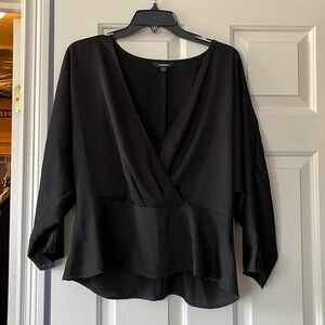 Express brand black women’s top in size large with crisscross front